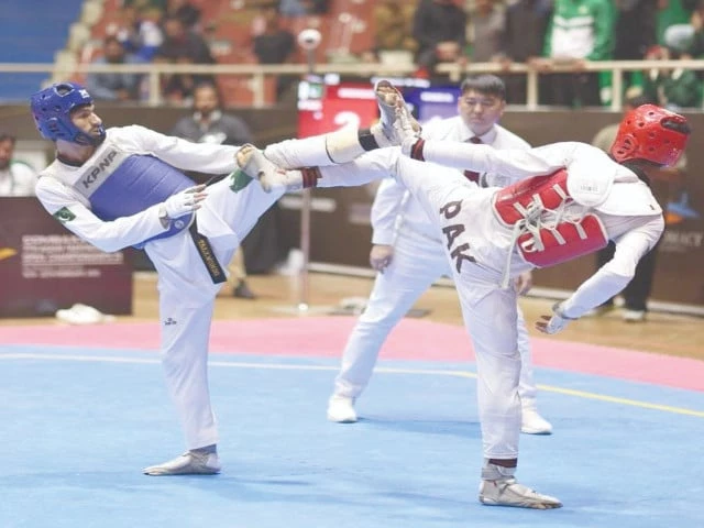 pakistan s gold medallist haroon khan competes with compatriot abu bakar in the 58kg category taekwondo contest on wednesday photo app pakistan s gold medallist haroon khan competes with compatriot abu bakar in the 58kg category taekwondo contest on wednesday photo app