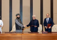 defence minister khawaja muhammad asif and afghan defence minister mullah mohammad yaqoob mujahid shake hands following the signing of a ceasefire agreement mediated by qatar and turkey in doha on october 19 photo reuters