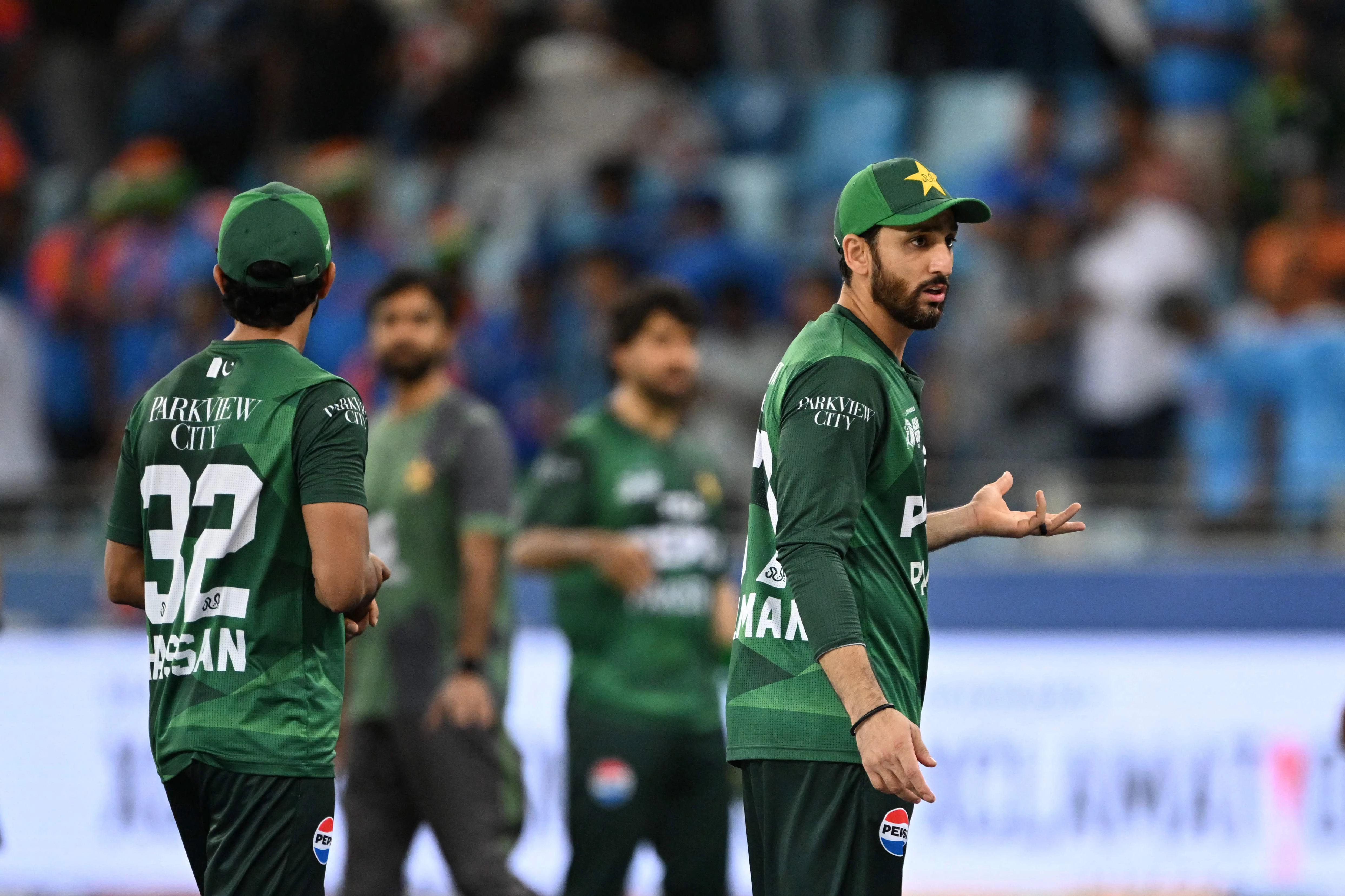 pakistan s captain salman agha r reacts at the end of the asia cup 2025 twenty20 international cricket match against india at the dubai international stadium in dubai on september 14 2025 photo afp