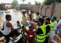 volunteers distribute food packets to villagers in flood affected areas as the sutlej river swelled following heavy rains on the outskirts of multan in punjab province on september 5 2025 photo afp volunteers distribute food packets to villagers in flood affected areas as the sutlej river swelled following heavy rains on the outskirts of multan in punjab province on september 5 2025 photo afp