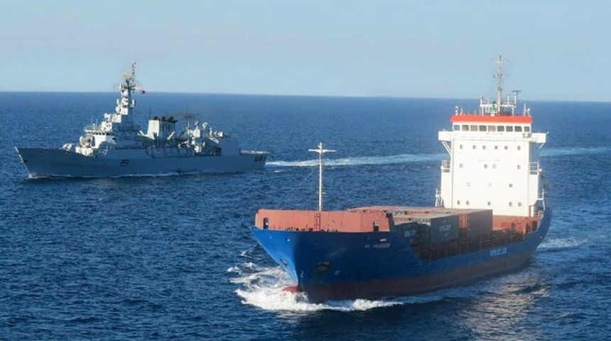 pakistan navy ship escorting merchant vessel in arabian sea photo radio pakistan