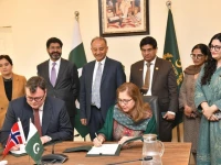 officials sign a memorandum of understanding in islamabad under the ministry of climate change and environmental coordination on wednesday with climate minister musadik malik also present photo pid