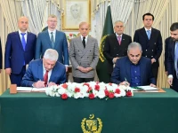interior minister mohsin naqvi and his russian counterpart vladimir kolokoltsev sign an mou on strengthening cooperation in combating organised crime at a ceremony in islamabad on wednesday witnessed by prime minister shehbaz sharif photo pmo