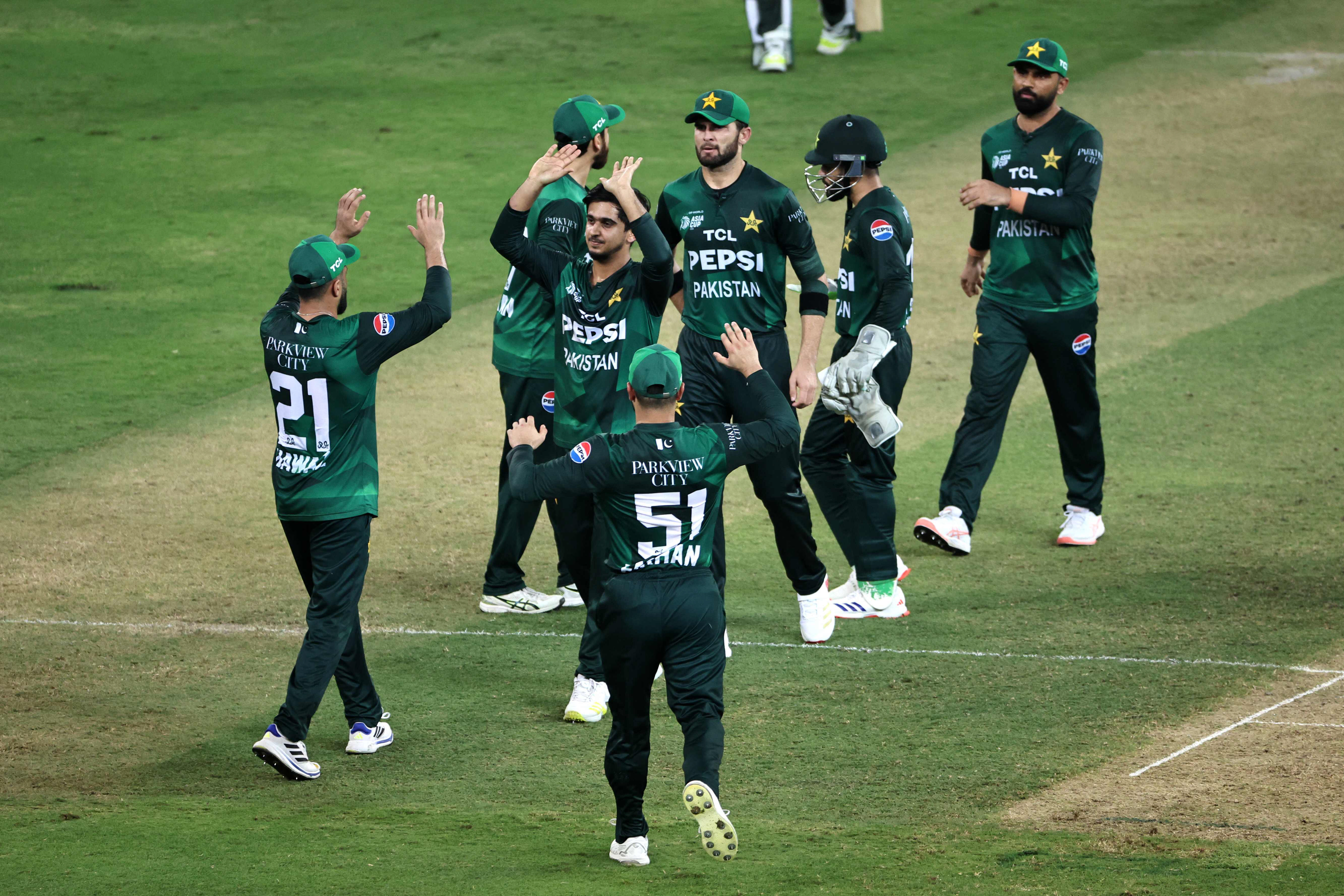 Pakistan's players celebrate after the dismissal of Bangladesh's captain Jaker Ali during the Asia Cup 2025 Super Four Twenty20 international cricket match between Bangladesh and Pakistan at the Dubai International Stadium in Dubai on September 25, 2025. Photo: AFP