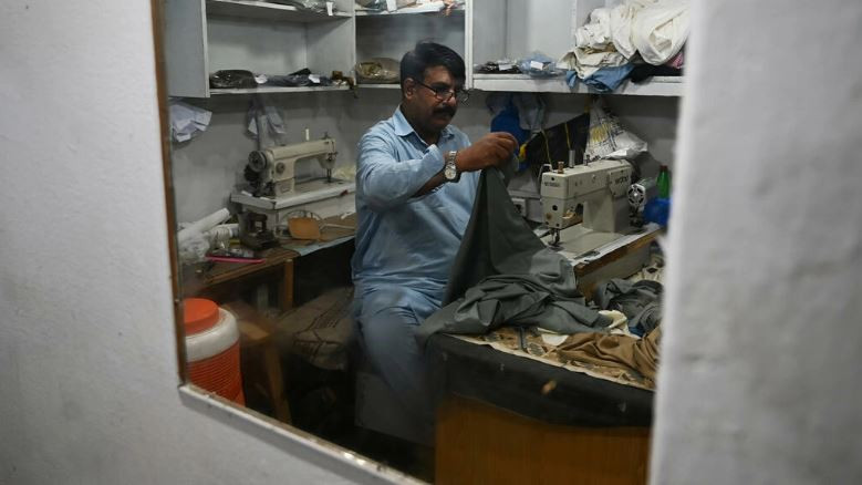 muhammad razzaq said two armed men barged into his islamabad store before making off with 240 completed or near finished shalwar kameez outfits photo afp