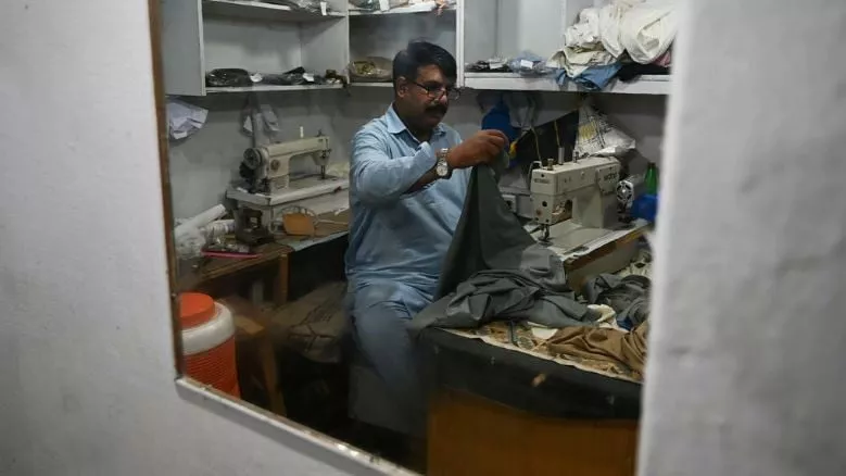 muhammad razzaq said two armed men barged into his islamabad store before making off with 240 completed or near finished shalwar kameez outfits photo afp muhammad razzaq said two armed men barged into his islamabad store before making off with 240 completed or near finished shalwar kameez outfits photo afp