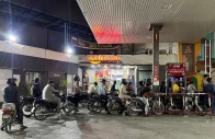 people on their motorbikes wait for their turn to get fuel at a petrol station hours before fuel prices are raised in pakistan amid the u s  israeli conflict with iran in karachi pakistan april 30 2026 picture taken with a mobile phone reuters