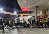 people on their motorbikes wait for their turn to get fuel at a petrol station hours before fuel prices are raised in pakistan amid the us israeli conflict with iran in karachi pakistan april 30 2026 picture taken with a mobile phone reuters