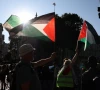 people wave palestinian flags during a protest after british lawmakers voted to ban pro palestinian campaign group palestine action as a terrorist organization outside downing street in london britain july 2 2025
