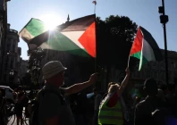 people wave palestinian flags during a protest after british lawmakers voted to ban pro palestinian campaign group palestine action as a terrorist organization outside downing street in london britain july 2 2025