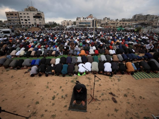 Palestinian Muslims attend the Eidul Azha prayer, in Gaza City, on May 27, 2026. PHOTO: REUTERS