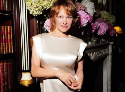 pamela anderson debuts dramatic red hair for michael cera s first film love is not the answer