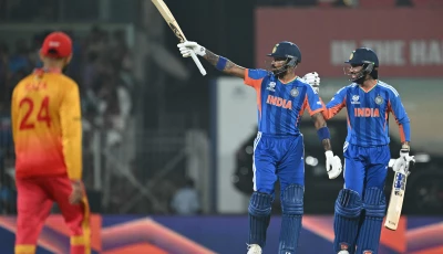 ndia s hardik pandya c celebrates after scoring his half century 50 runs as teammate tilak varma r looks on during the 2026 icc men s t20 cricket world cup super eights match between india and zimbabwe at the ma chidambaram stadium in chennai on february 26 2026 photo afp