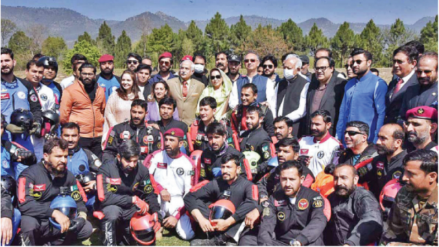 adventure enthusiasts photographed with paragliders and skydivers are federal ministers ghulam sarwar khan omar ayub and zulfiqar bukhari at the inaugural ceremony of the islamabad tourism festival at fatima jinnah park photo app adventure enthusiasts photographed with paragliders and skydivers are federal ministers ghulam sarwar khan omar ayub and zulfiqar bukhari at the inaugural ceremony of the islamabad tourism festival at fatima jinnah park photo app
