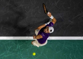 grigor dimitrov serves to giovanni mpetshi perricard during the paris atp masters 1000 tennis tournament at the paris la d fense arena in nanterre photo afp