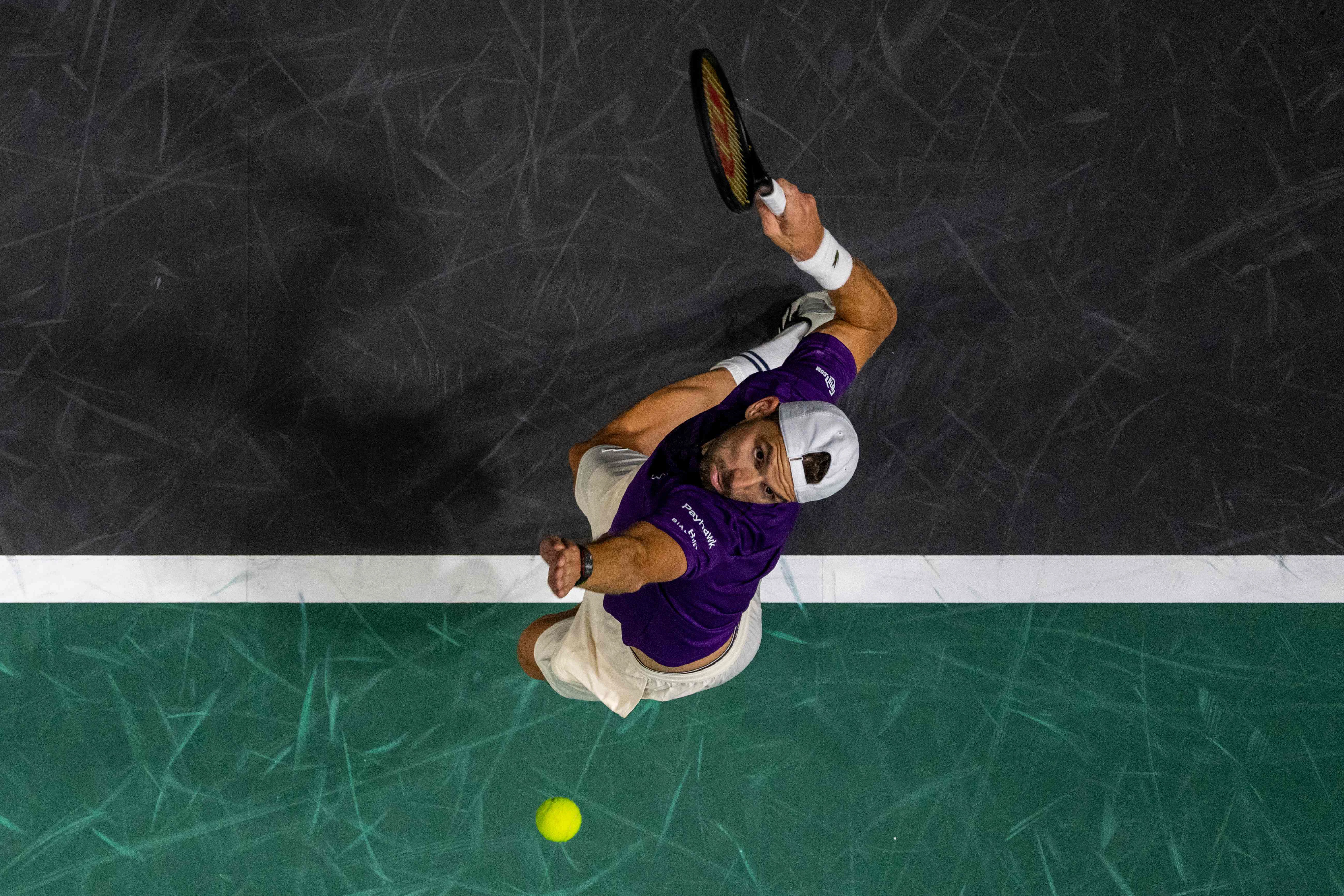 grigor dimitrov serves to giovanni mpetshi perricard during the paris atp masters 1000 tennis tournament at the paris la d fense arena in nanterre photo afp
