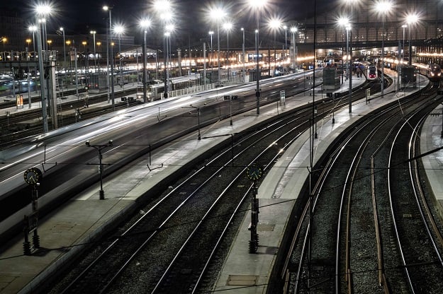 This photo taken in Paris shows tracks at the Gare du Nord rail station after all non-essential public places including restaurants and cafes have been shut as a precaution to contain the spread of the COVID-19. PHOTO: AFP