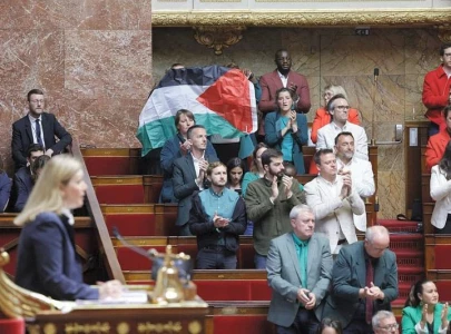 watch tumult in french parliament over palestinian flag clothing watch tumult in french parliament over palestinian flag clothing