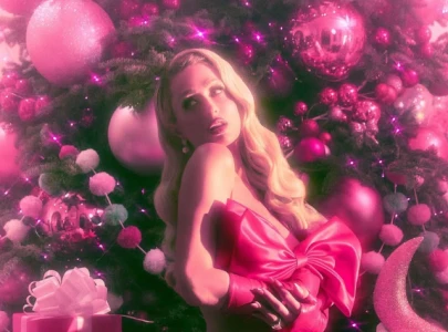 paris hilton shares christmas message wearing nothing but a bow in bold festive post