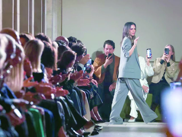 designer victoria beckham greets attendees during the presentation of her spring summer 2026 women s ready to wear collection during paris fashion week photo reuters