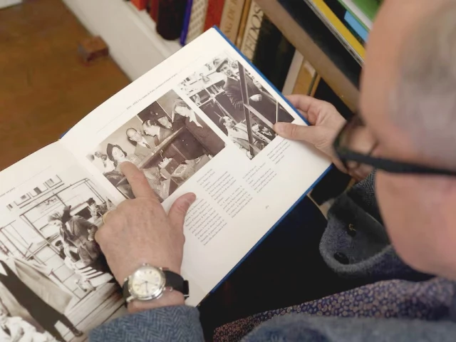 count of paris jean d orleans looks at a photo of a 1958 exhibition in lisbon that displayed jewellery worn by his grandmother and great grandmother and since stolen from the louvre museum during an interview with reuters photo reuters