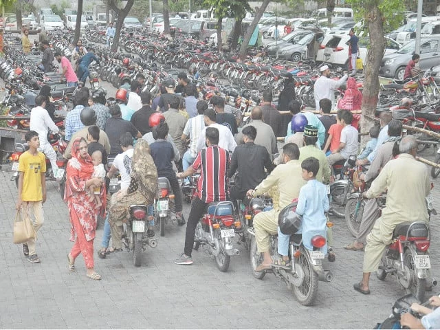 lahore zoo visitors park their motorbikes at a stand citizens flocked to outdoor recreational spots after rainfall turned the weather pleasant on the weekly holiday photo nni lahore zoo visitors park their motorbikes at a stand citizens flocked to outdoor recreational spots after rainfall turned the weather pleasant on the weekly holiday photo nni