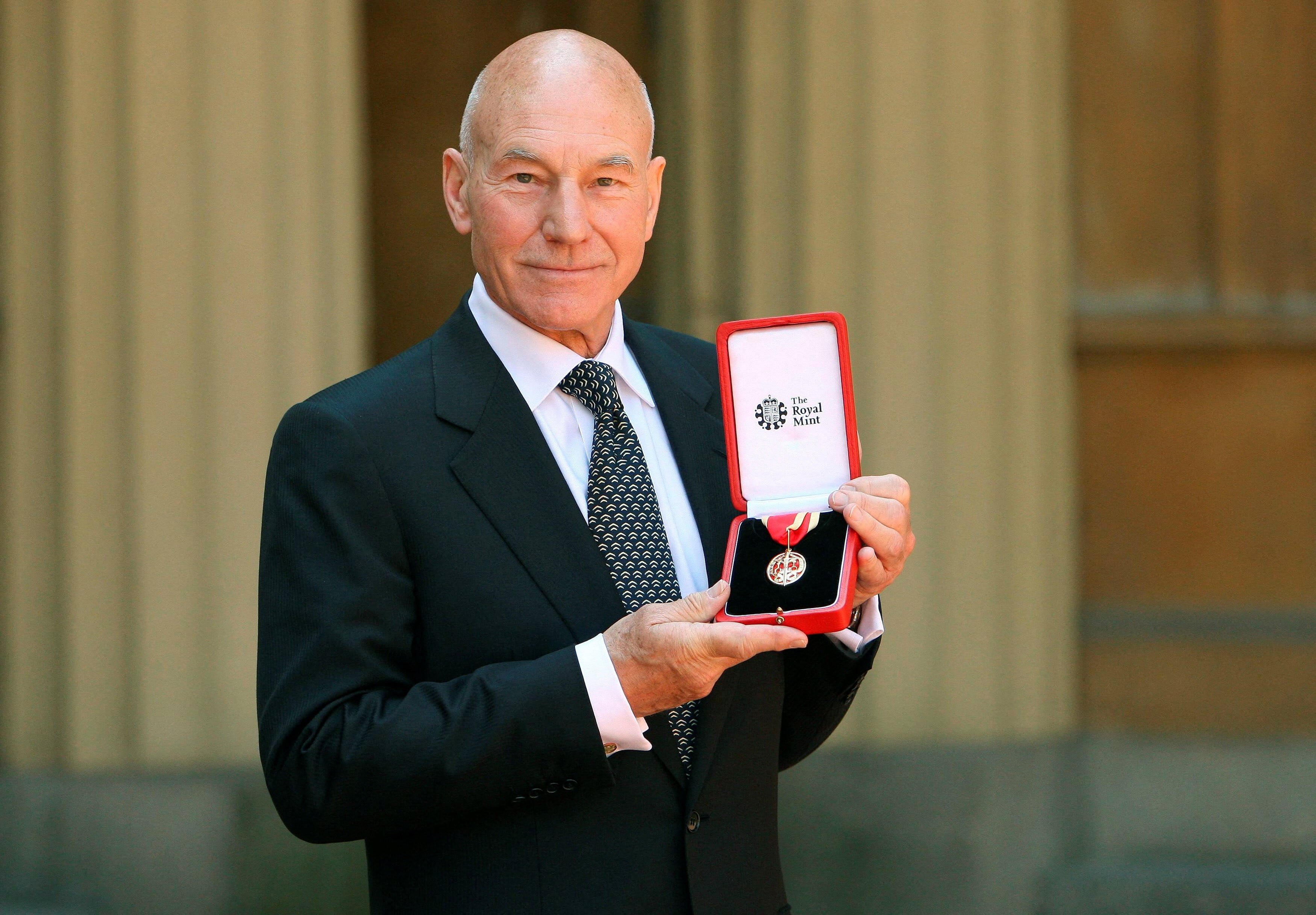 Actor Patrick Stewart poses with his knighthood after he was knighted by Britain's Queen Elizabeth at Buckingham Palace in London June 2, 2010. Photo: Reuters