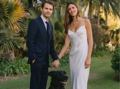 paul wesley marries natalie kuckenburg as the vampire diaries star says i do for third time