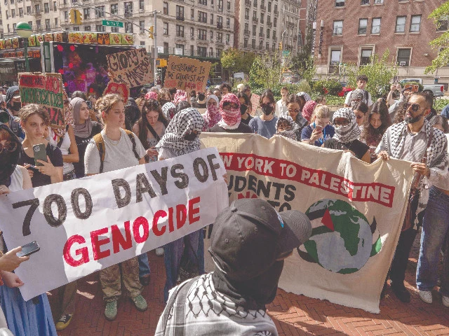 people attend a vigil and protest for palestine outside of columbia university in new york city photo afp