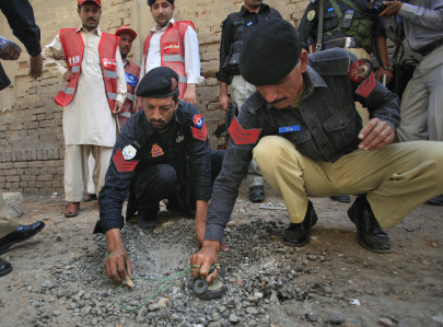 peshawar blast two police officials injured