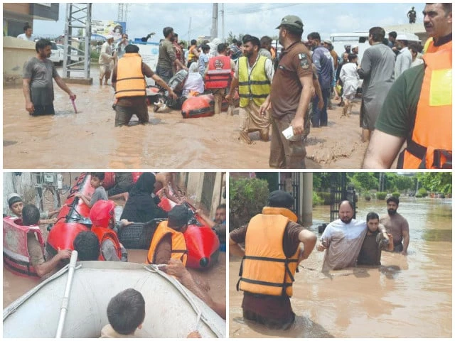 local residents move to safer places after a medium flood in budhni nullah inundated several low lying areas of peshawar photos express local residents move to safer places after a medium flood in budhni nullah inundated several low lying areas of peshawar photos express