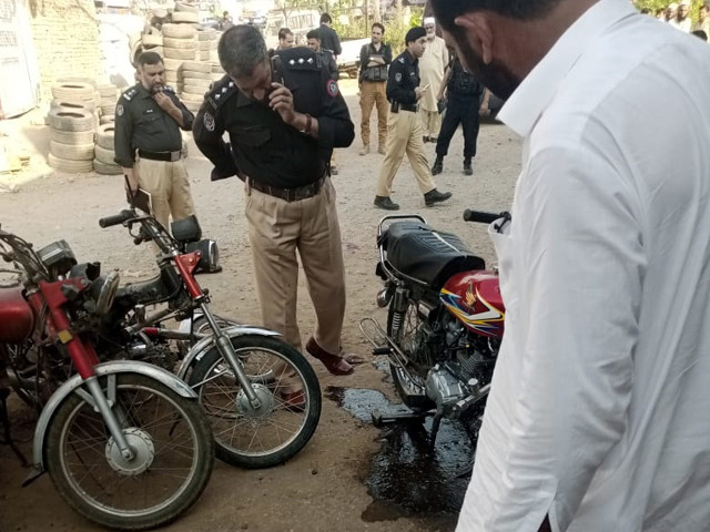 police officials are examining the site of blast in peshawar on may 18 2023 photo express