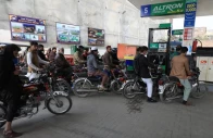 people wait for their turn to get fuel at a petrol station in peshawar on january 30 2023 photo reuters people wait for their turn to get fuel at a petrol station in peshawar on january 30 2023 photo reuters
