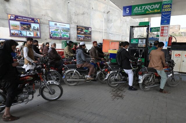 people wait for their turn to get fuel at a petrol station in peshawar on january 30 2023 photo reuters people wait for their turn to get fuel at a petrol station in peshawar on january 30 2023 photo reuters