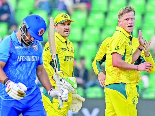 australia s nathan ellis r celebrates with teammates after dismissing afghanistan s gulbadin naib l in the icc champions trophy match at gaddafi stadium on friday photo afp australia s nathan ellis r celebrates with teammates after dismissing afghanistan s gulbadin naib l in the icc champions trophy match at gaddafi stadium on friday photo afp