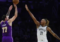 luka doncic of the los angeles lakers shoots over noah clowney in the lakers nba victory over the brooklyn nets photo afp