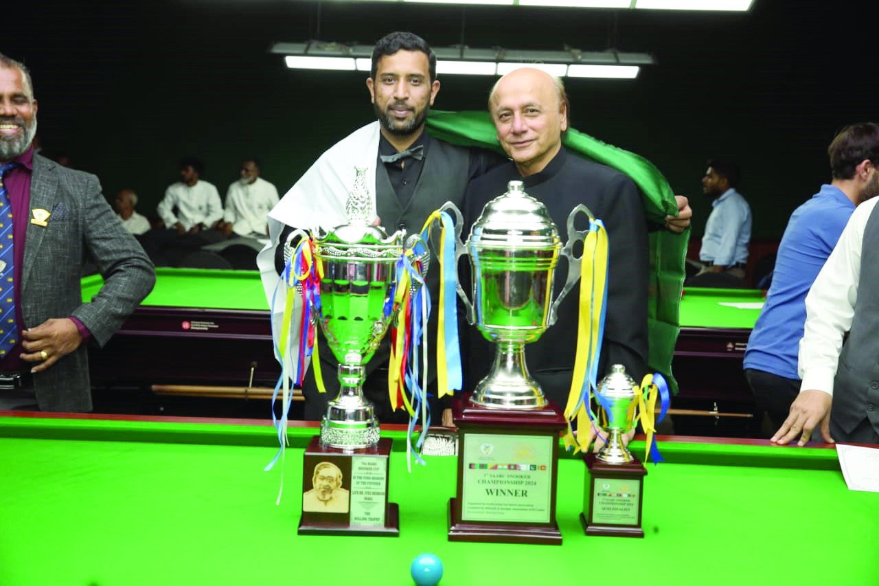 mohammad asif and president of snooker association of pakistan alamgir shaikh seen with the trophies after the 3rd saarc snooker championship final in colombo on friday photo pbsa