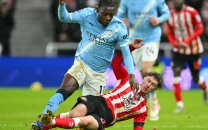 manchester city s title bid dented