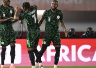victor osimhen l celebrates with ademola lookman as frank onyeka watches on during nigeria s comfortable win against mozambique at the africa cup of nations photo afp