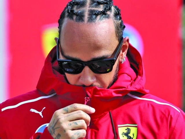 lewis hamilton will make his race debut for ferrari in melbourne photo afp