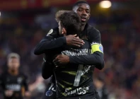 psg s khvicha kvaratskhelia celebrates with teammate ousmane dembele after he scored the opening goal during the french league one soccer match between lens and paris saint germain in lens photo afp