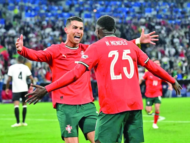portugal s cristiano ronaldo celebrates scoring their second goal with nuno mendes photo reuters portugal s cristiano ronaldo celebrates scoring their second goal with nuno mendes photo reuters
