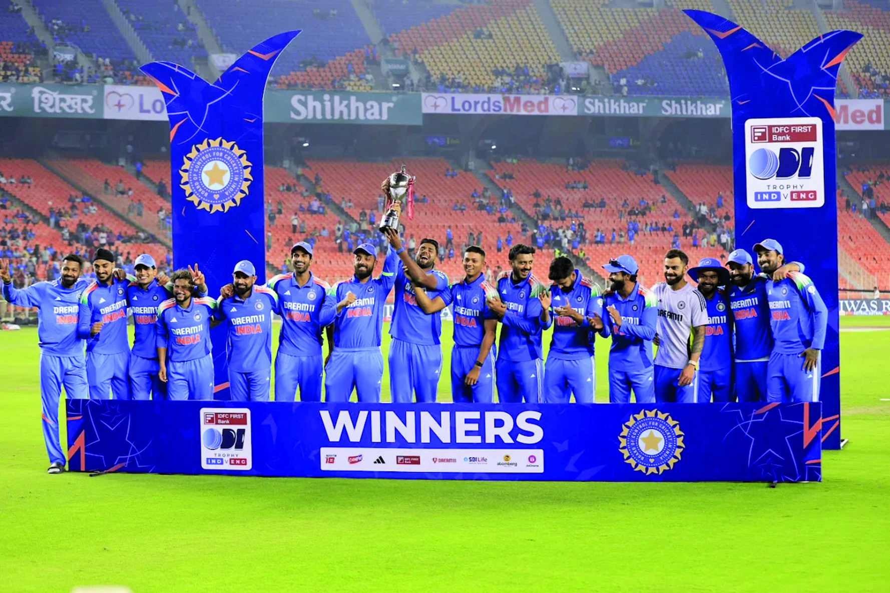 the victorious india team poses with the trophy photo bcci