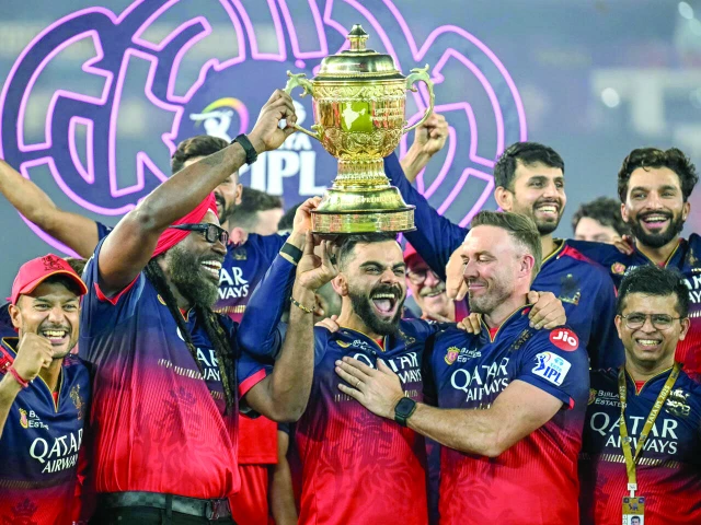 virat kohli centre celebrates winning the ipl with bengaluru teammates photo afp virat kohli centre celebrates winning the ipl with bengaluru teammates photo afp