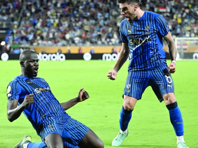 al hilal s senegalese defender kalidou koulibaly celebrates with teammate ruben neves after scoring his team s third goal photo afp