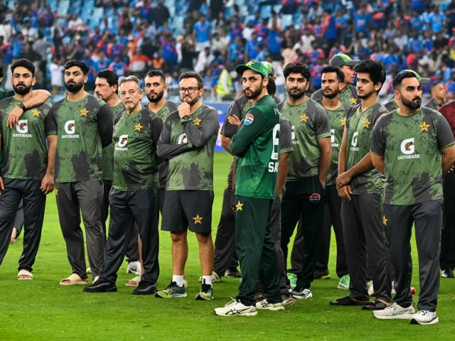 a dejected pakistan side after the loss in the final photo afp