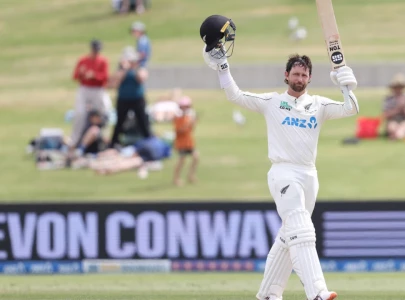 conway hits ton as new zealand sense victory