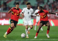 egypt s forward salah mohsen centre fights for the ball with angola s defender david carmo left and angola s defender kialonda gaspar right during the africa cup of nations photo afp