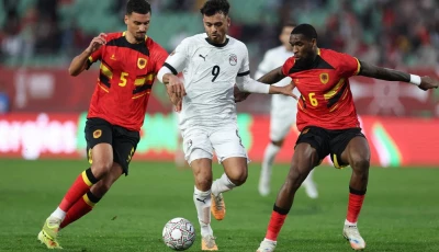 egypt s forward salah mohsen centre fights for the ball with angola s defender david carmo left and angola s defender kialonda gaspar right during the africa cup of nations photo afp