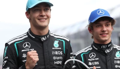 pole winner mercedes british driver george russell l and teammate italian driver kimi antonelli 2nd position celebrate after the qualifying session for the formula one australian grand prix photo afp